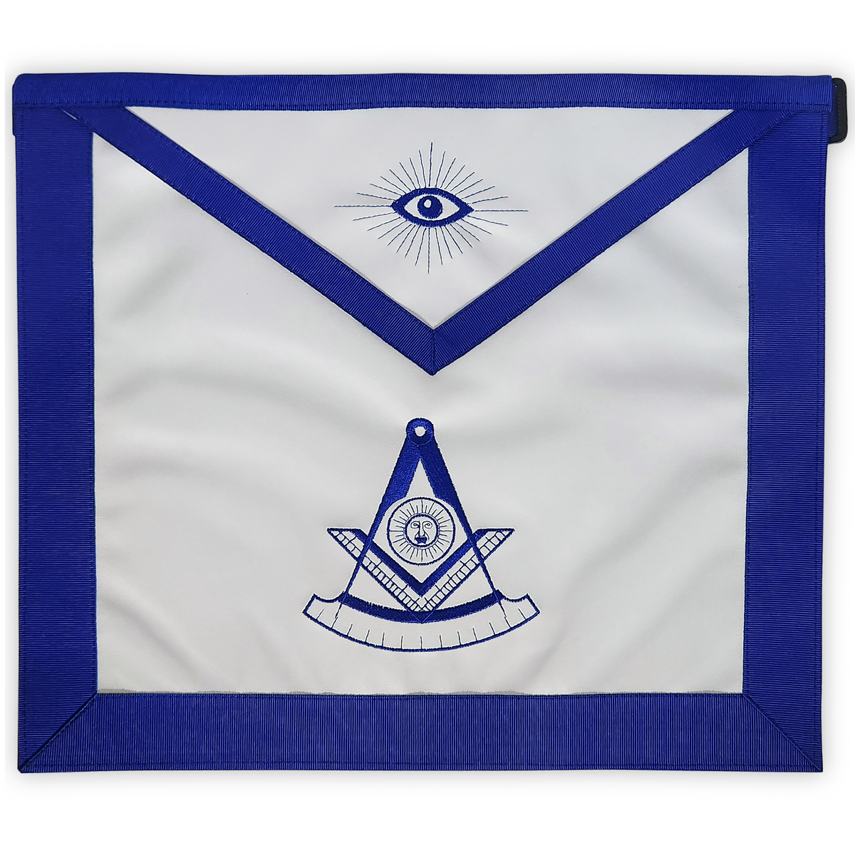 Masonic apron with machine embroidered past master symbol, featuring a square and compass with the all-seeing eye, bordered by a royal blue ribbon.